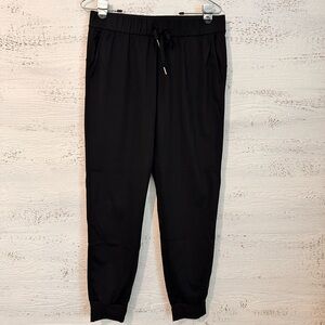 Ajisai black joggers.  Size M